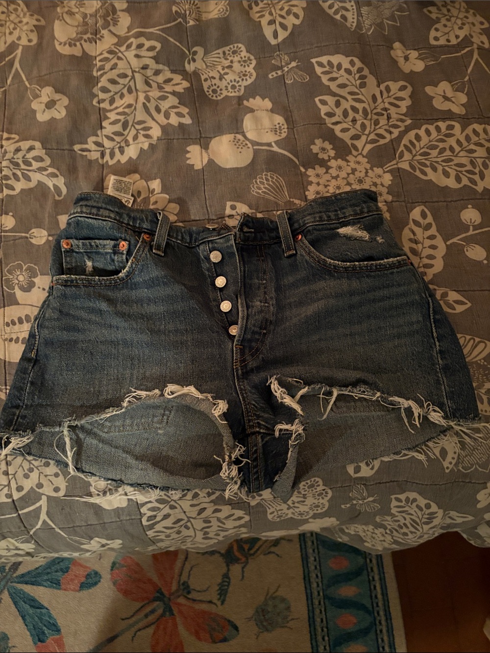 Levi's Medium Blue Distressed Button-Fly Cutoff Shorts